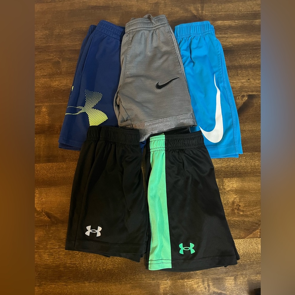Lot of athletic shorts (5 pair). Nike/Under Armor. Size 4-5.